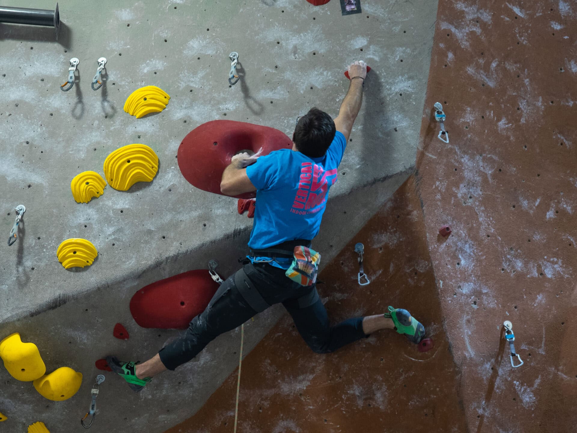 Climber making a dynamic move during speed and agility training